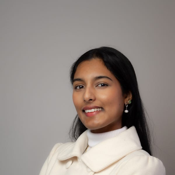 Anjali Prasad Rhodes Realty Rhodes