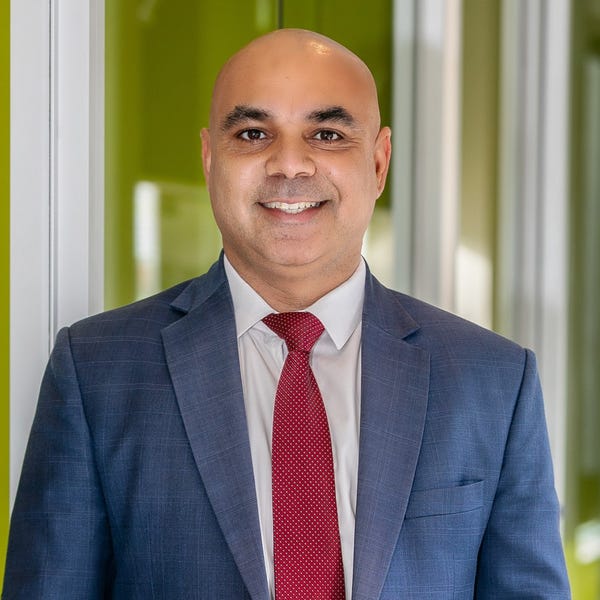 Micckey V Grover Mancini Real Estate Altona