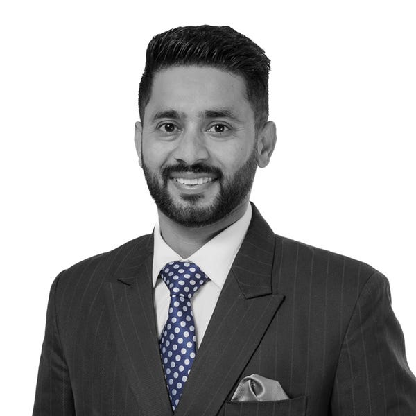 Gary Singh First National Real Estate Genesis