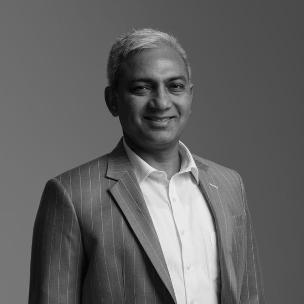 Dinesh Mann Mann Estate Agents