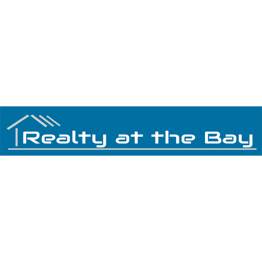 Realty at the Bay - RUNAWAY BAY logo