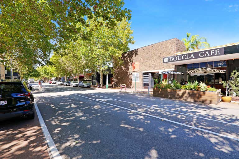 Leafy commercial street with shops and cafes in Subiaco